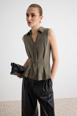 Haki D_z Peplum Polo Yaka Kolsuz Pili Detayl_ Modal Kuma_ _rme Bluz TWOAW27BZ00106