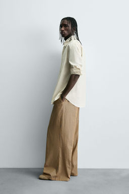 STRIPED OVERSIZE FIT TROUSERS