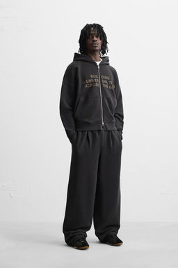 WASHED PLEATED JOGGER TROUSERS