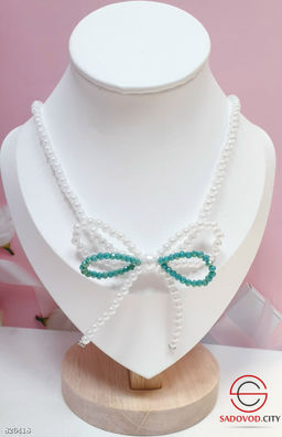 Чокер из жемчуга с бантом