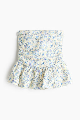 Top bandeau con peplum