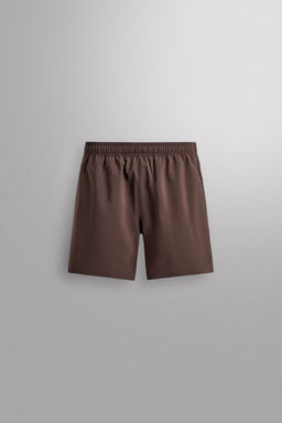 PANTALONES CORTOS ENTRENAMIENTO 9" / Marr?n