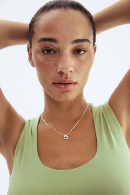 Top sin mangas en microfibra - H&m фото 3