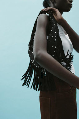 OVAL STUDDED FRINGED BAG