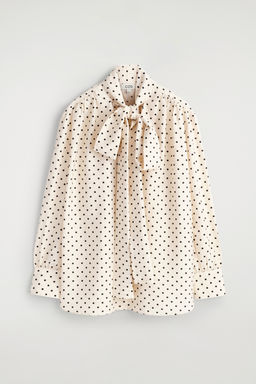 BLUSA DE LUNARES CON LAZADA
