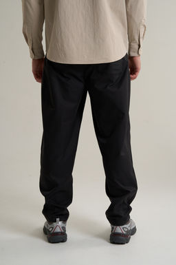 Брюки текстильные Черный COMMUTE Woven Track Pants - Anta фото 6