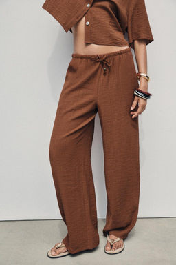WIDE-LEG TROUSERS WITH ELASTIC WAISTBAND - Zara фото 21