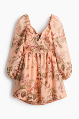 Vestido de manga abullonada con lazada