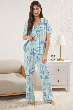 Trendyolmilla Pembe Hayvan Desenli Biyeli Viskon Dokuma Pijama Tak?m? THMSS25PT00022