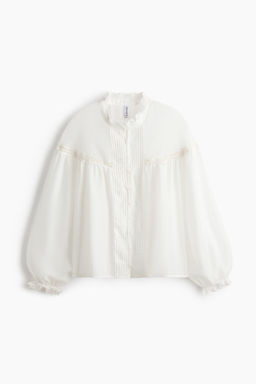 Blusa de manga globo con volantes