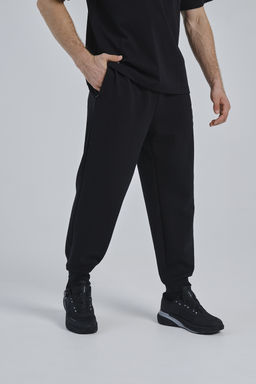 Брюки трикотажные Черный COMMUTE Knit Track Pants