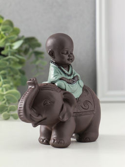 Сувенир полистоун "Маленький будда на слоне" зелёно-коричневый 5,5х12х12 см