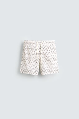 GEOMETRIC PRINT MID-LENGTH SWIMMING TRUNKS