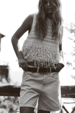 TEXTURED KNIT TOP WITH FRINGING