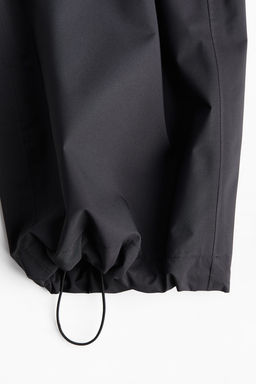Pantalon chubasquero unisex en StormMove - H&m фото 11