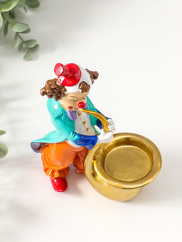 Подсвечник полистоун на 1 свечу "Клоун играет на трубе" яркий разноцветный 17 см