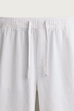 PANTAL?N RELAXED FIT JACQUARD LAVADO / Blanco - Zara фото 8