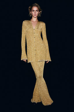 Pantalon brillante en punto de canale