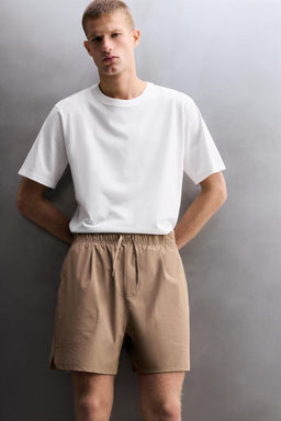 PANTALONES CORTOS T?CNICOS TRAINING / Marr?n claro