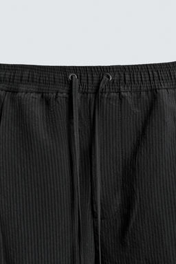BERMUDA FLUIDA JACQUARD RAYAS / Negro - Zara фото 9