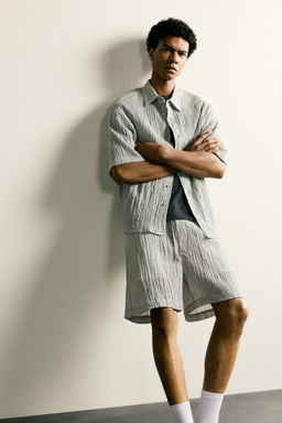 BERMUDA RELAXED FIT RELIEVE / Gris claro - Zara фото 6