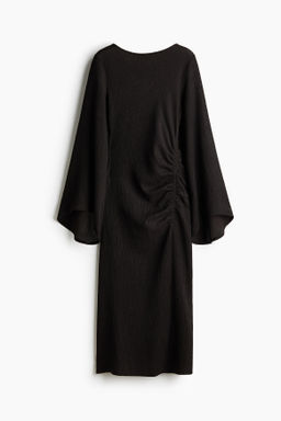 Vestido de punto con mangas trompeta
