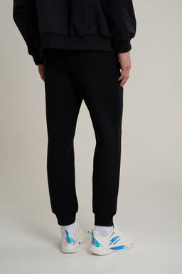 Брюки трикотажные Черный TRN ESSENTIAL Knit Track Pants