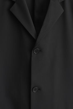BLAZER DESESTRUCTURADA DE TWILL T?CNICO SLIM FIT