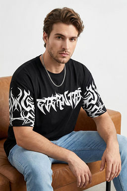 Siyah Oversize/Geni_ Kesim Bask_l_ %100 Pamuk T-Shirt TMNSS25TS00192