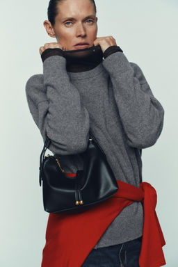 MINI BUCKET BAG WITH BALL DETAIL