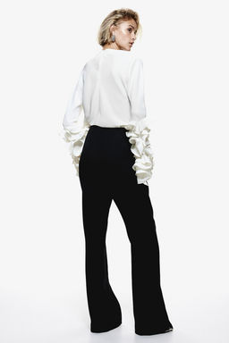 Pantalon acampanado de sarga con abertura - H&m фото 2