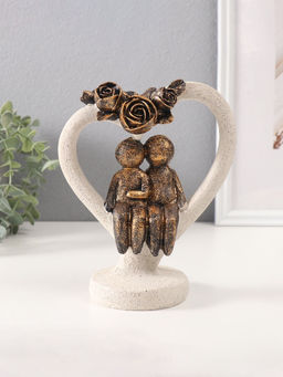 Фигурка полистоун Влюблённые человечки в каменном сердце с розами, под бронзу, 8.8?15.7?20 см