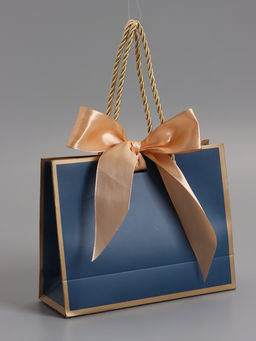 Пакет подарочный ламинированный, тёмно синий с золотым, с бантом, 19×15×7 см