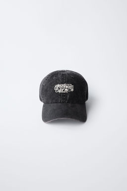 WASHED-EFFECT CAP WITH EMBROIDERED TEXT