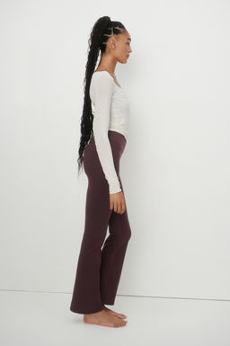 Leggings de yoga acampanados con SoftMove - H&m фото 15