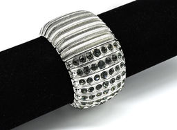 Металлический широкий браслет с цирконом цв.топаз