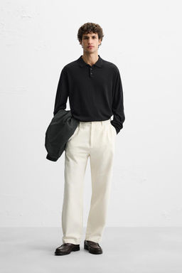 RELAXED FIT PLEATED TROUSERS