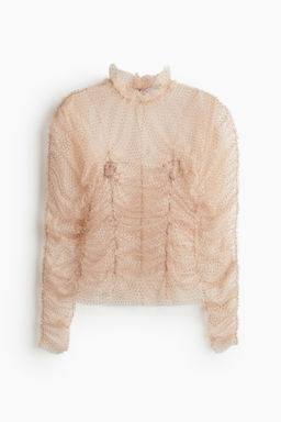 Top de malla con detalles bordados