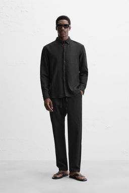 REGULAR FIT JOGGER WAIST TROUSERS - Zara фото 31