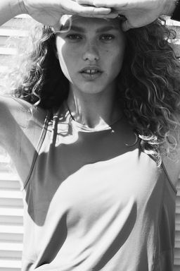 Top de deporte sin mangas en DryMove - H&m фото 2