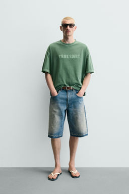 CAMISETA BOXY FIT LAVADA GR?FICOS / Verde
