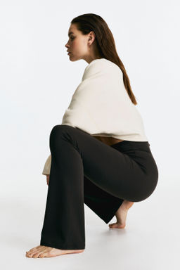 Leggings de yoga acampanados con SoftMove Lycra® - H&m фото 4