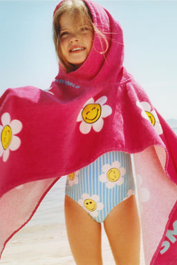 PONCHO TOALLA SMILEYWORLD ® / Fucsia