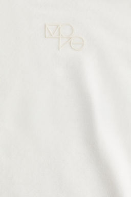 Top de deporte cruzado en modal - H&m фото 15