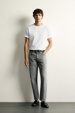 JEANS SLIM TAPERED FIT / Gris