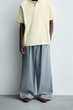 STRIPED OVERSIZE FIT TROUSERS