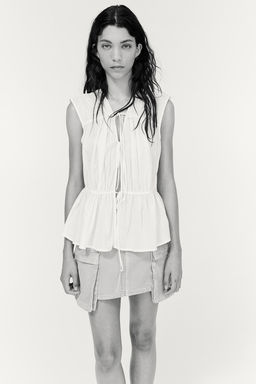 Blusa de algodon con lazadas