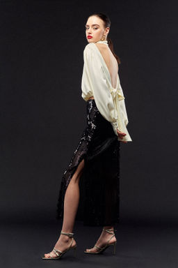 Юбка из пайеток с разрезом