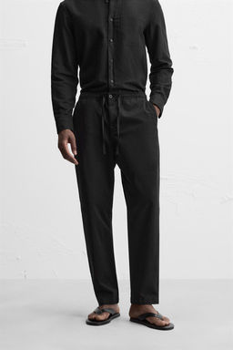 REGULAR FIT JOGGER WAIST TROUSERS - Zara фото 32