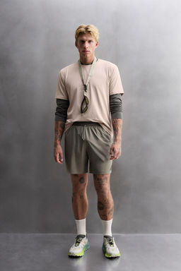 LIGHTWEIGHT PERFORATED SHORTS